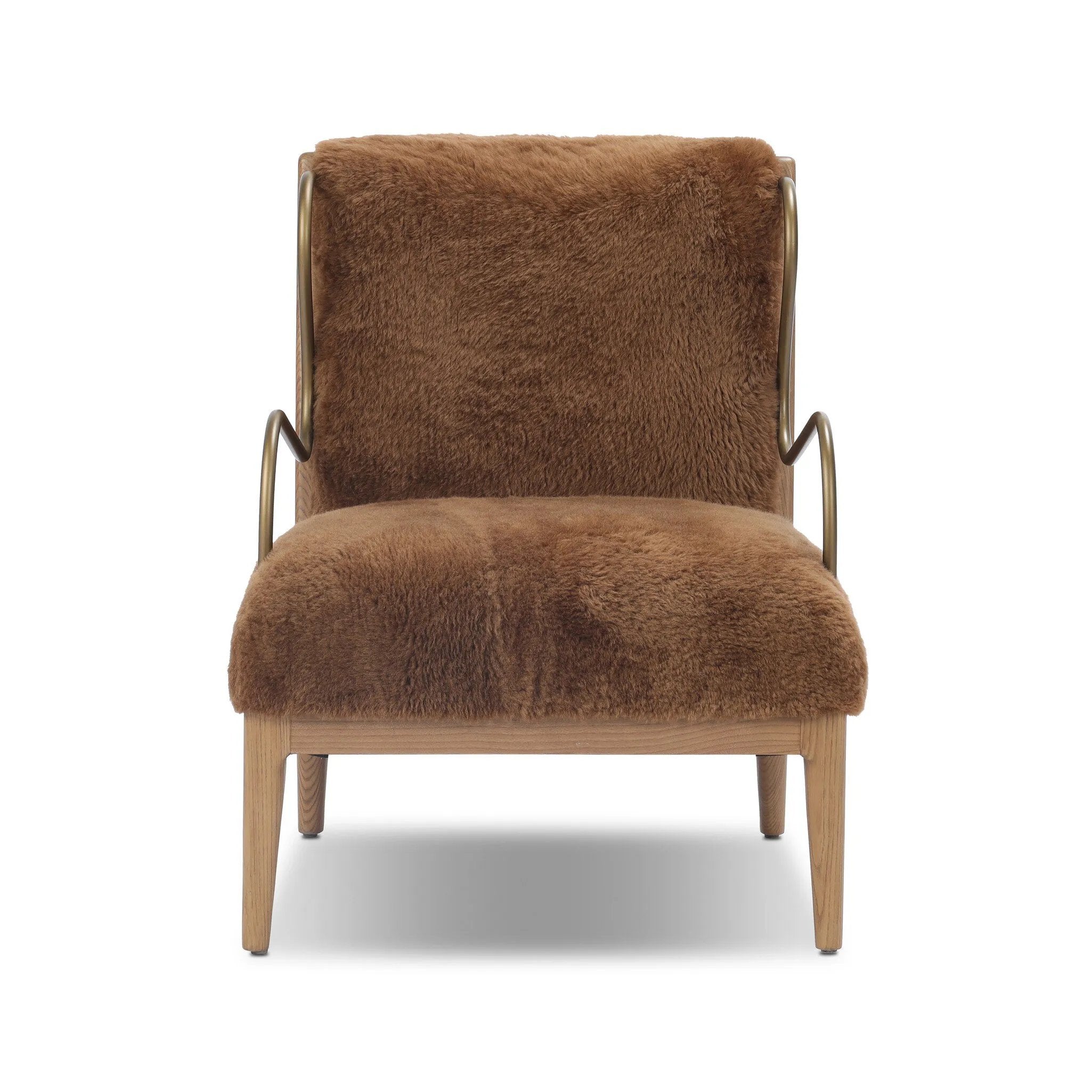 Bring the soul of a vintage find to your living room with this artfully updated accent chair. Solid ash legs and swooping iron arms give it a curated look, while a plush seat ensure comfort. Wrapped in cozy shearling to make any room feel instantly inviting. Amethyst Home provides interior design, new home construction design consulting, vintage area rugs, and lighting in the Houston metro area.
