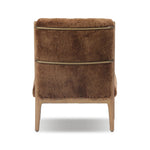 Bring the soul of a vintage find to your living room with this artfully updated accent chair. Solid ash legs and swooping iron arms give it a curated look, while a plush seat ensure comfort. Wrapped in cozy shearling to make any room feel instantly inviting. Amethyst Home provides interior design, new home construction design consulting, vintage area rugs, and lighting in the Kansas City metro area.