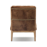 Bring the soul of a vintage find to your living room with this artfully updated accent chair. Solid ash legs and swooping iron arms give it a curated look, while a plush seat ensure comfort. Wrapped in cozy shearling to make any room feel instantly inviting. Amethyst Home provides interior design, new home construction design consulting, vintage area rugs, and lighting in the Kansas City metro area.