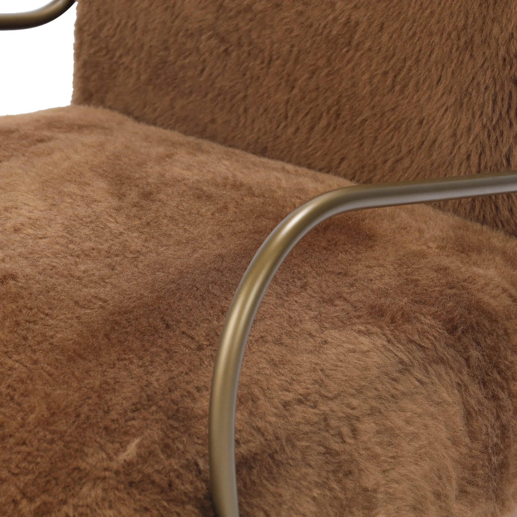 Bring the soul of a vintage find to your living room with this artfully updated accent chair. Solid ash legs and swooping iron arms give it a curated look, while a plush seat ensure comfort. Wrapped in cozy shearling to make any room feel instantly inviting. Amethyst Home provides interior design, new home construction design consulting, vintage area rugs, and lighting in the Newport Beach metro area.