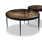 Smoky brown glass tops with slim, tapered matte black metal frames in a sleek, contemporary design. Available as a nesting set or standalone tables.Collection: Marlo Amethyst Home provides interior design, new home construction design consulting, vintage area rugs, and lighting in the Miami metro area.