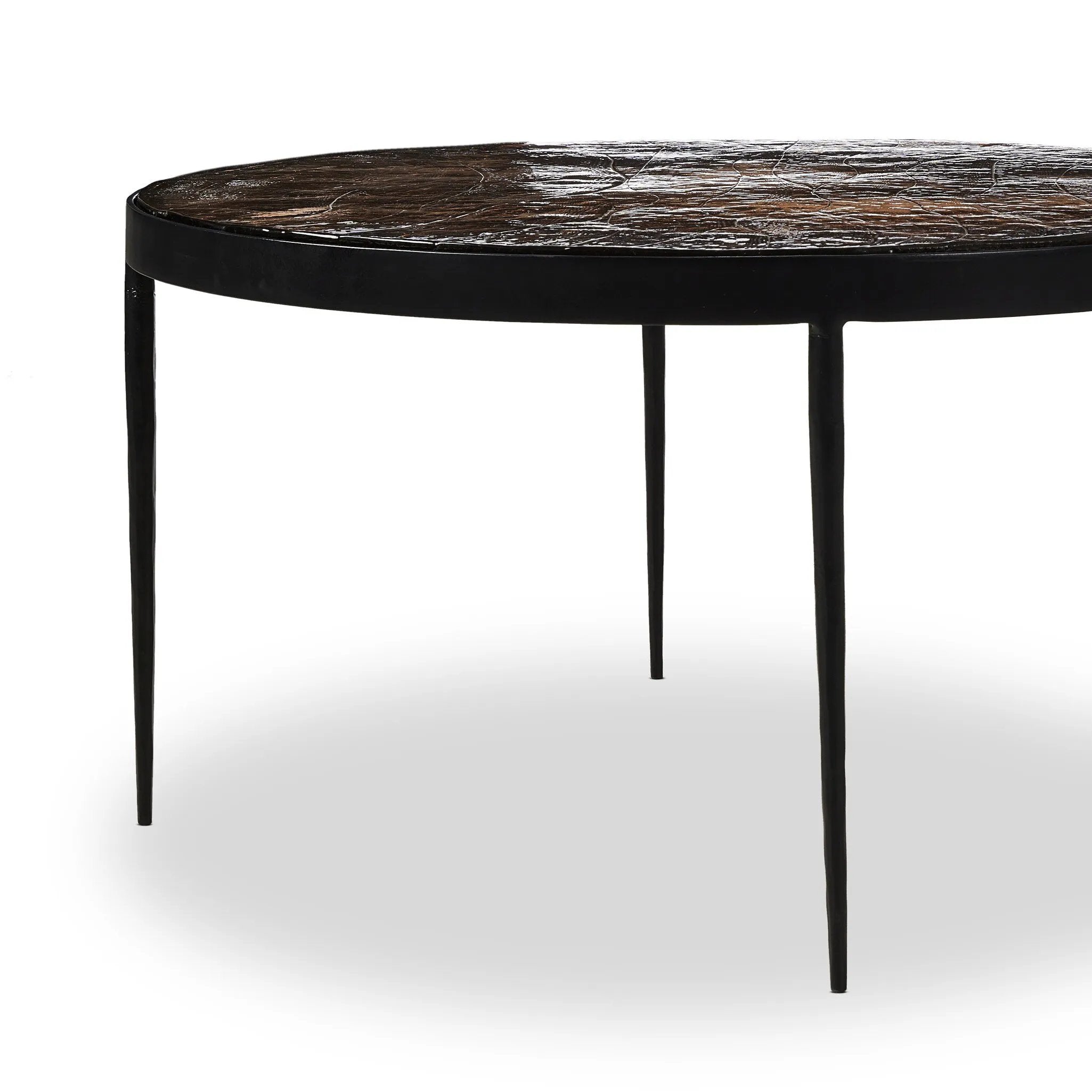Smoky brown glass-topped table with slim, tapered matte black metal frames for a sleek, modern look. Part of a nesting set, can be used alone or paired with its smaller counterpart.Collection: Marlo Amethyst Home provides interior design, new home construction design consulting, vintage area rugs, and lighting in the Winter Garden metro area.