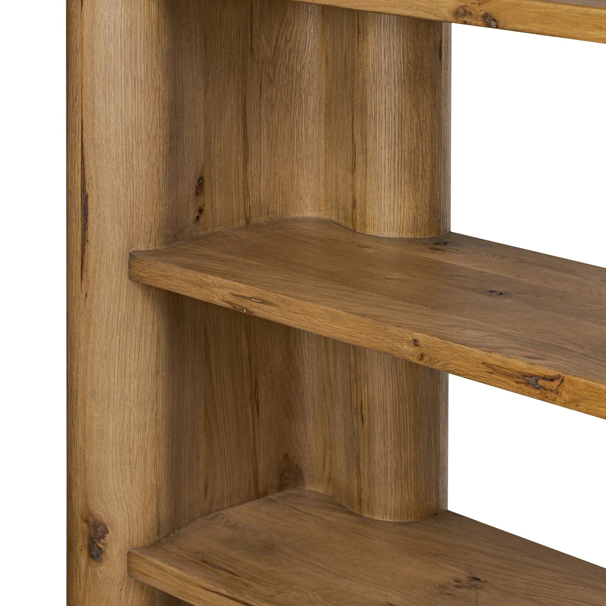 Thick, curvy and rounded sides give this bookcase its playful character inspired by soft Brutalism. Made from light, solid oak, substantial shelving provides generous space for books, photos and keepsakes Amethyst Home provides interior design, new home construction design consulting, vintage area rugs, and lighting in the Laguna Beach metro area.