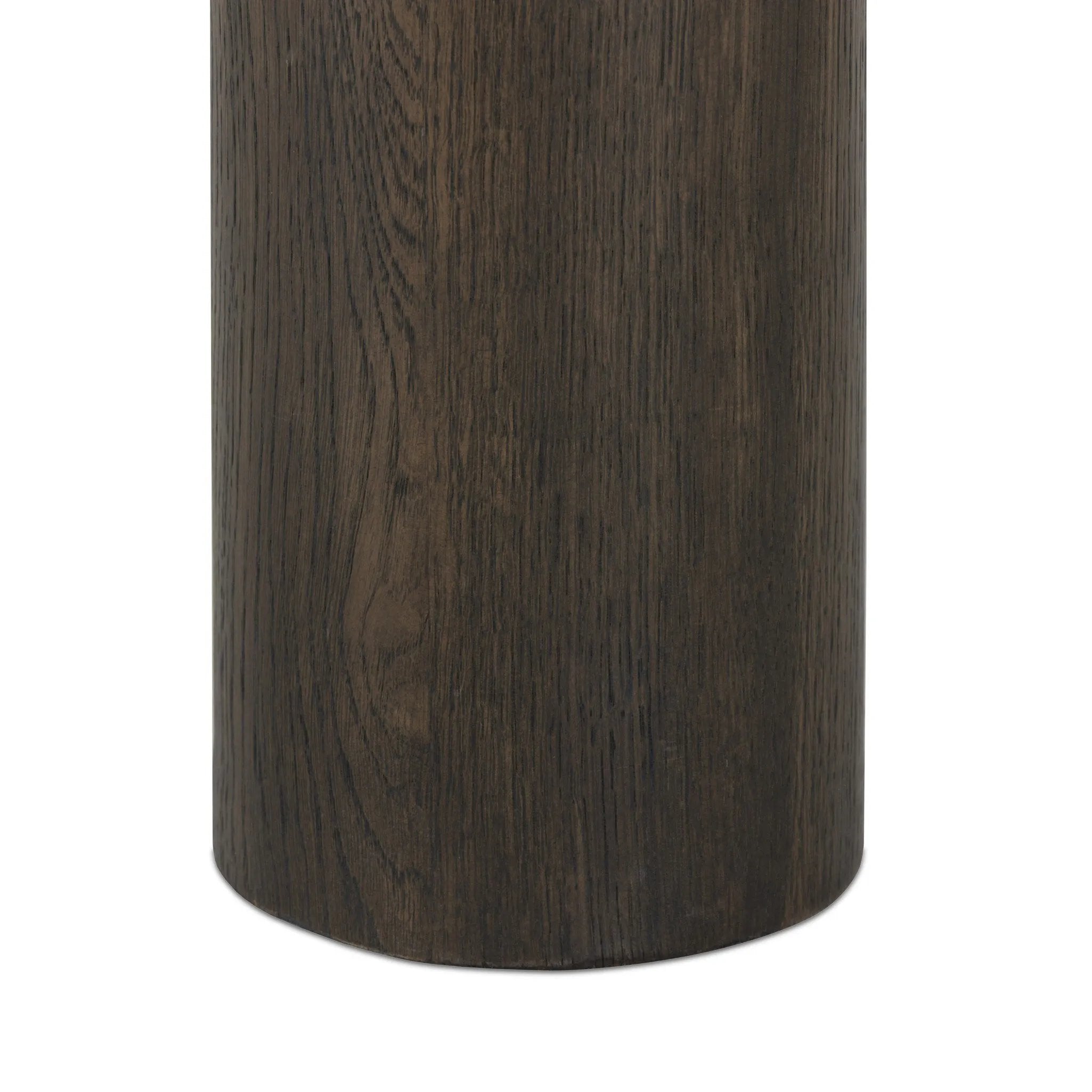 Shape and material share the spotlight in this pedestal-style end table of solid grey oak Amethyst Home provides interior design, new home construction design consulting, vintage area rugs, and lighting in the Nashville metro area.