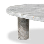 Shape and material share the spotlight in this large, tripod-style onyx coffee table. Turned, pillar legs and dramatic natural veining offer a look of movement. Option to pair with smaller matching table for a nested look Amethyst Home provides interior design, new home construction design consulting, vintage area rugs, and lighting in the Park City metro area.