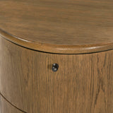 Modern with hints of heritage and Art Deco, crafted of warm, spiced oak. A flexible layering piece that can be styled just about anywhere — as a nightstand or in the entryway or hallway, its slight scale and demilune shape are great for smaller spaces, as its flat back can be styled right up against the wall. Amethyst Home provides interior design, new home construction design consulting, vintage area rugs, and lighting in the Laguna Beach metro area.