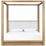 Minimalist and modern, this platform-style canopy bed is framed to a low profile and softened with an upholstered headboard. The character-rich oak's rounded corners and light brown finish add to the bed's fresh appeal Amethyst Home provides interior design, new home construction design consulting, vintage area rugs, and lighting in the Charlotte metro area.