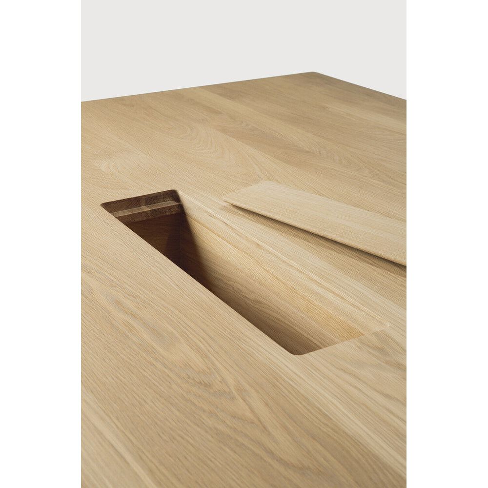 Featuring Geometric Oak Meeting Table by Ethnicraft at Amethyst Home. In the Geometric collection, shapes intersect in unexpected ways, creating playful contrasts with light and shadow at every angle. The Geometric meeting table elevates a professional space with softened edges and natural lines at play, adding volume and practical comfort further enhanced by integrated wire man. Amethyst Home provides interior design, new construction, custom furniture, and area rugs in the Los Angeles metro area