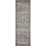 Featuring soft motifs in a carefully curated color palate of black, blue, yellow, and hints of orange, the Hathaway Navy / Multi area rug captures the essence of one-of-a-kind vintage or antique area rug. This rug is ideal for high traffic areas such as living rooms, dining rooms, kitchens, hallways, and entryways.