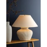 The Allards table lamp draws inspiration from traditional pottery and the beauty of artisan glazing. Its ceramic, urn-like silhouette is finished in Watercolor Sand with a painterly application that lends movement to the surface. Amethyst Home provides interior design, new home construction design consulting, vintage area rugs, and lighting in the Miami metro area.
