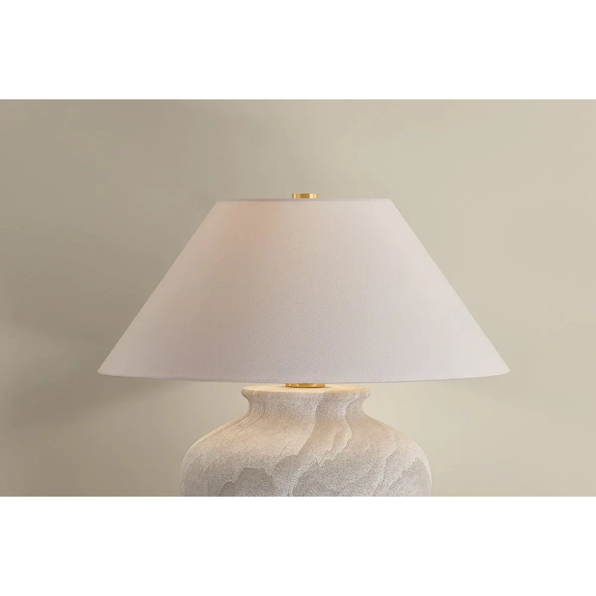 The Allards table lamp draws inspiration from traditional pottery and the beauty of artisan glazing. Its ceramic, urn-like silhouette is finished in Watercolor Sand with a painterly application that lends movement to the surface. Amethyst Home provides interior design, new home construction design consulting, vintage area rugs, and lighting in the Portland metro area.