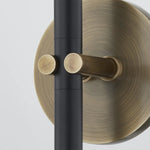 A traditional design with modern detailing, Belvedere is defined by its uniquely held candlesticks. Each Patina Brass arm on the ten-light chandelier holds two Texture Black candlesticks pierced through on opposing sides of the arm. The candlestick on the one-light wall sconce is pinched in place by two Patina Brass arms. Amethyst Home provides interior design, new home construction design consulting, vintage area rugs, and lighting in the Newport Beach metro area.