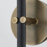 A traditional design with modern detailing, Belvedere is defined by its uniquely held candlesticks. Each Patina Brass arm on the ten-light chandelier holds two Texture Black candlesticks pierced through on opposing sides of the arm. The candlestick on the one-light wall sconce is pinched in place by two Patina Brass arms. Amethyst Home provides interior design, new home construction design consulting, vintage area rugs, and lighting in the Newport Beach metro area.