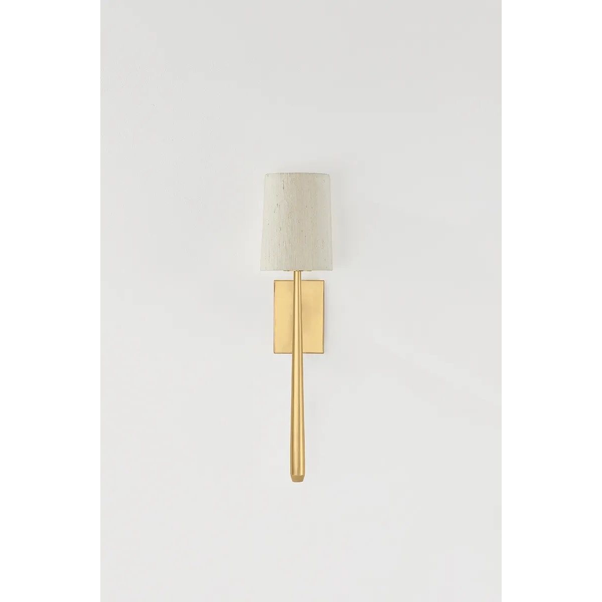 Combining soft materiality and refined form language, the Bridgeton family blends into both modern and classic interiors. Natural silk shades add depth and richness by adding texture to the framework. While the sconce is minimal and timeless, the two sizes of chandelier feature a unique twist on a ring silhouette. Amethyst Home provides interior design, new home construction design consulting, vintage area rugs, and lighting in the Miami metro area.