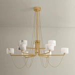 Playing with the concept of jewelry as installation, Bunda mixes structure and fluidity to create eye-catching drama. Finished in Vintage Brass, delicate rope chains dangle and loop across the streamlined arms of this 3- or 9-light chandelier. Amethyst Home provides interior design, new home construction design consulting, vintage area rugs, and lighting in the Calabasas metro area.