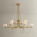 Playing with the concept of jewelry as installation, Bunda mixes structure and fluidity to create eye-catching drama. Finished in Vintage Brass, delicate rope chains dangle and loop across the streamlined arms of this 3- or 9-light chandelier. Amethyst Home provides interior design, new home construction design consulting, vintage area rugs, and lighting in the Portland metro area.