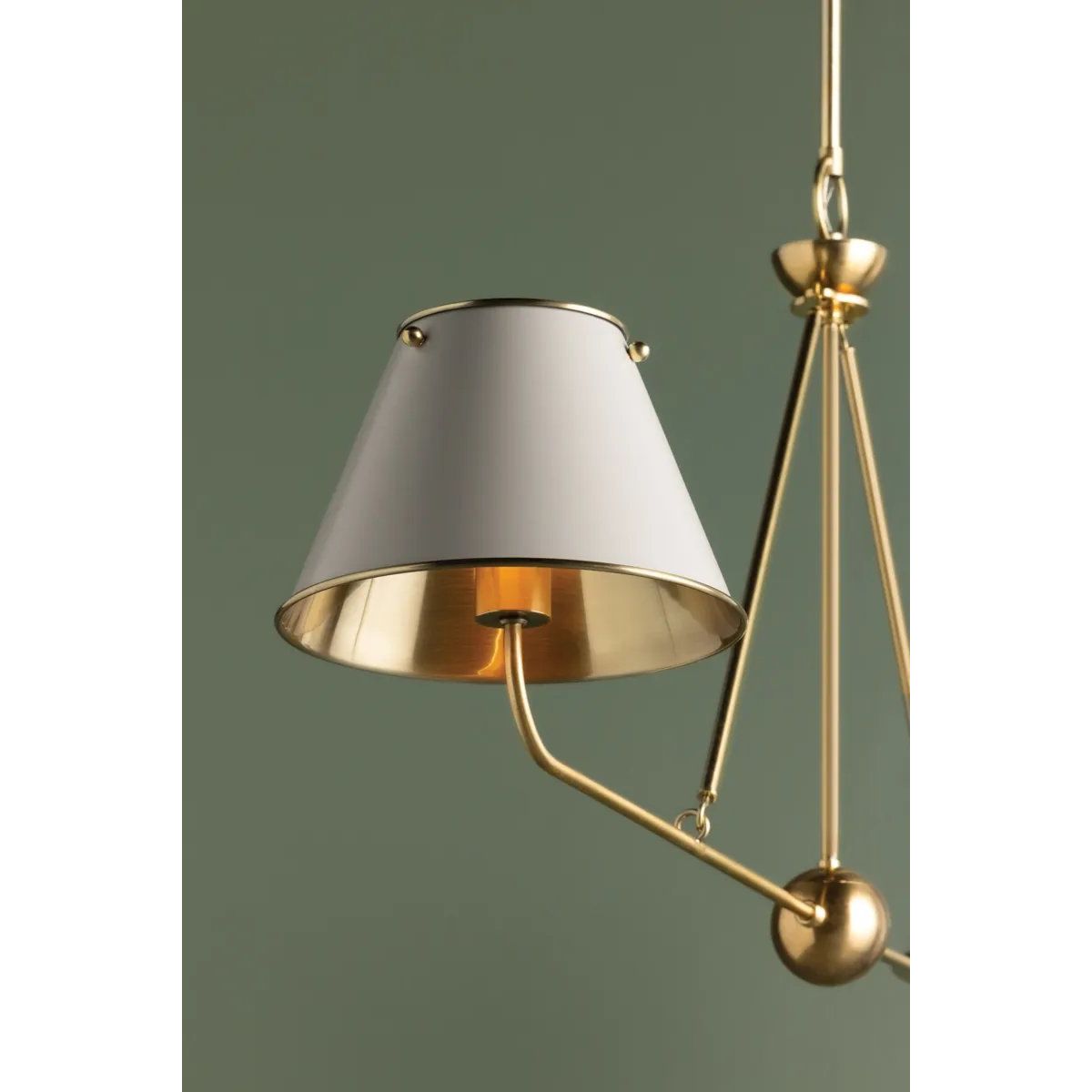 The Burghley family channels a tailored aesthetic with clean lines and sleek metal shades. Featuring Mark D. Sikes’ signature brass ball detail as well as stylish bolts securing the shades, Burghley makes heritage-inspired silhouettes feel fresh. Amethyst Home provides interior design, new home construction design consulting, vintage area rugs, and lighting in the Winter Garden metro area.