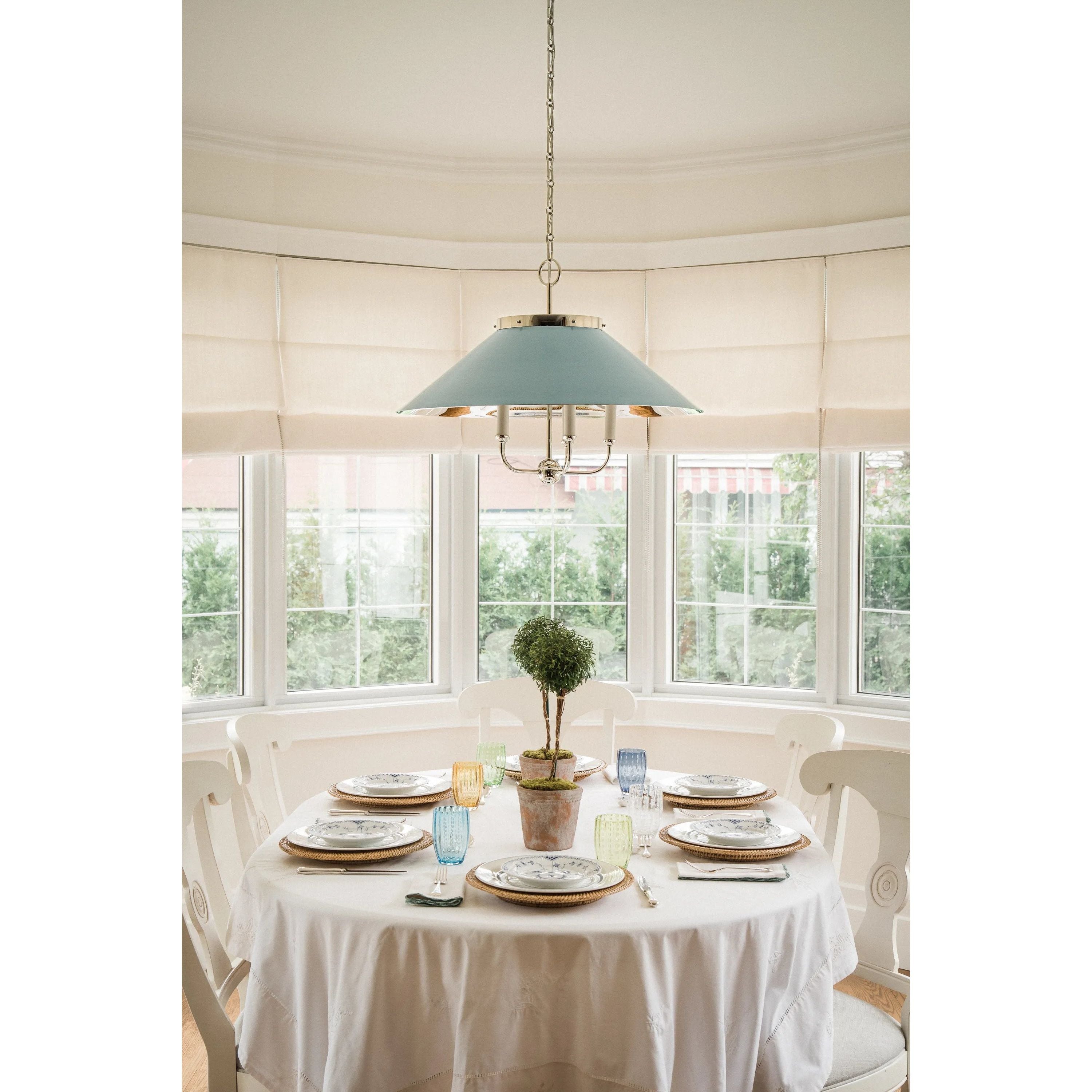 This classic metal shade design feels special with fresh finish combinations and sleek, heritage-inspired details. The contrastiing Aged Brass accents and modern gooseneck arm allow the pendants and sconce an updated, yet classic feel. The tapered shade over a five-light candelabra give the chandelier new traditional appeal. Amethyst Home provides interior design, new home construction design consulting, vintage area rugs, and lighting in the Miami metro area.