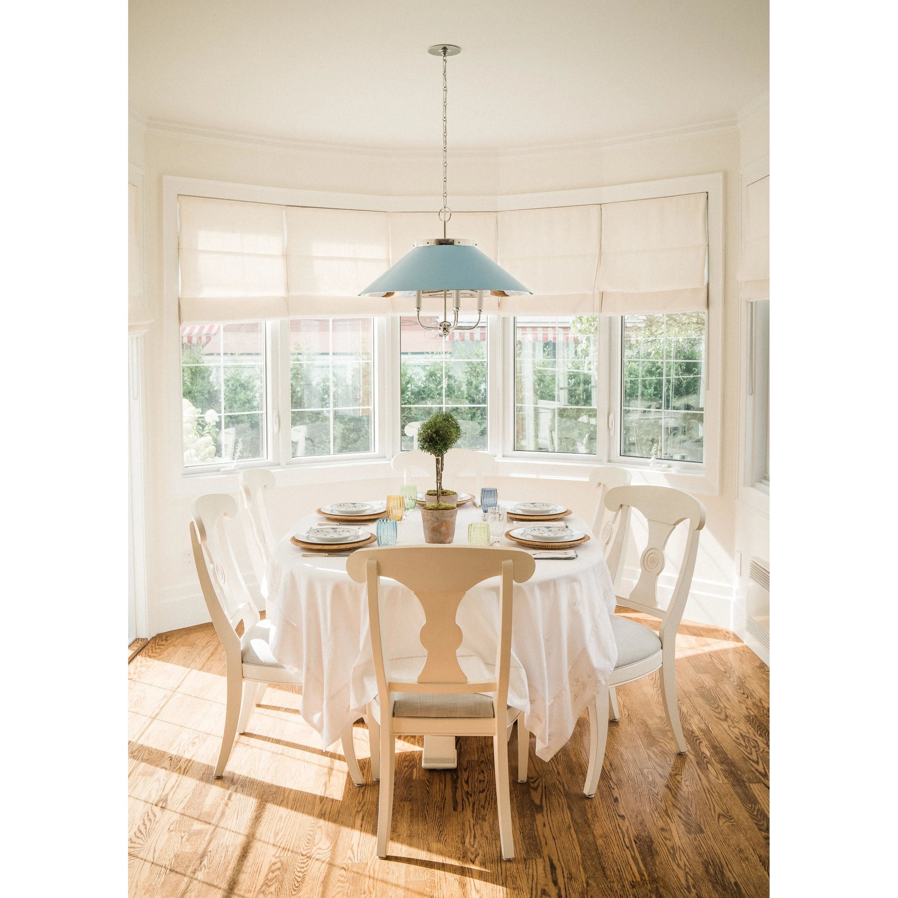 This classic metal shade design feels special with fresh finish combinations and sleek, heritage-inspired details. The contrastiing Aged Brass accents and modern gooseneck arm allow the pendants and sconce an updated, yet classic feel. The tapered shade over a five-light candelabra give the chandelier new traditional appeal. Amethyst Home provides interior design, new home construction design consulting, vintage area rugs, and lighting in the Newport Beach metro area.