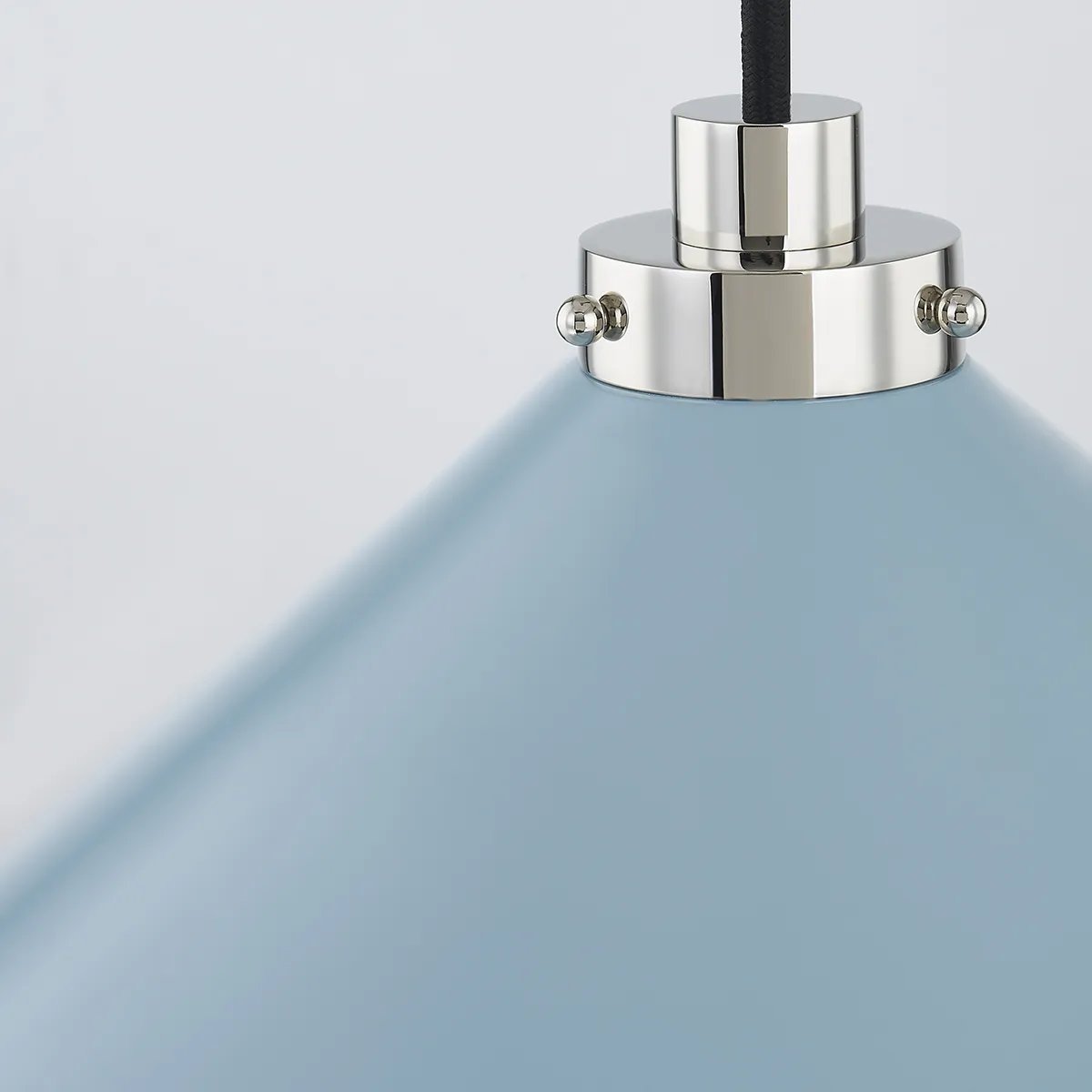 This classic metal shade design feels special with fresh finish combinations and sleek, heritage-inspired details. The contrastiing Aged Brass accents and modern gooseneck arm allow the pendants and sconce an updated, yet classic feel. The tapered shade over a five-light candelabra give the chandelier new traditional appeal. Amethyst Home provides interior design, new home construction design consulting, vintage area rugs, and lighting in the Laguna Beach metro area.