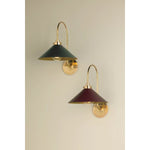 What began as a chandelier is now an entire family of Clivedon fixtures. Featuring sharp tapered shades and heritage-inspired details, these are the new elevated basics for the modern home. With Aged Brass and either Soft Studio Green or Soft Crimson finish options, each shade is metal on the inside and painted on the outside. Amethyst Home provides interior design, new home construction design consulting, vintage area rugs, and lighting in the Laguna Beach metro area.