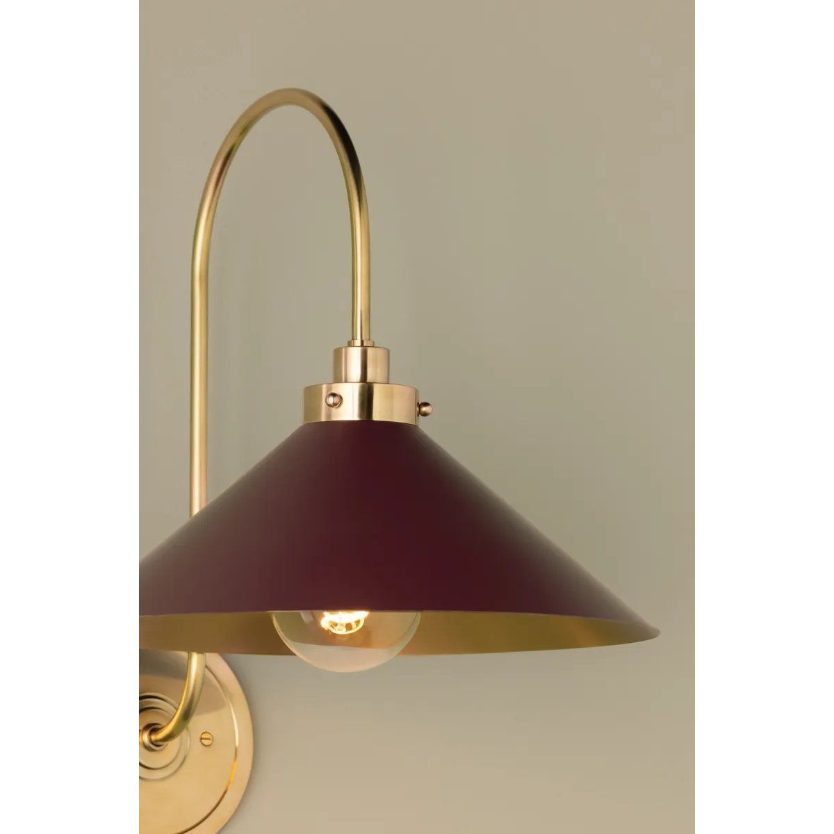 What began as a chandelier is now an entire family of Clivedon fixtures. Featuring sharp tapered shades and heritage-inspired details, these are the new elevated basics for the modern home. With Aged Brass and either Soft Studio Green or Soft Crimson finish options, each shade is metal on the inside and painted on the outside. Amethyst Home provides interior design, new home construction design consulting, vintage area rugs, and lighting in the Los Angeles metro area.