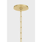 A vintage-inspired silhouette is elevated through thoughtful details in this transitional family. Arranged at varying heights, the overscale white linen tapered shades create a voluminous effect, like a sail billowing in the wind. Ivory trim provides subtle visual interest while remaining fresh and neutral. Amethyst Home provides interior design, new home construction design consulting, vintage area rugs, and lighting in the San Diego metro area.