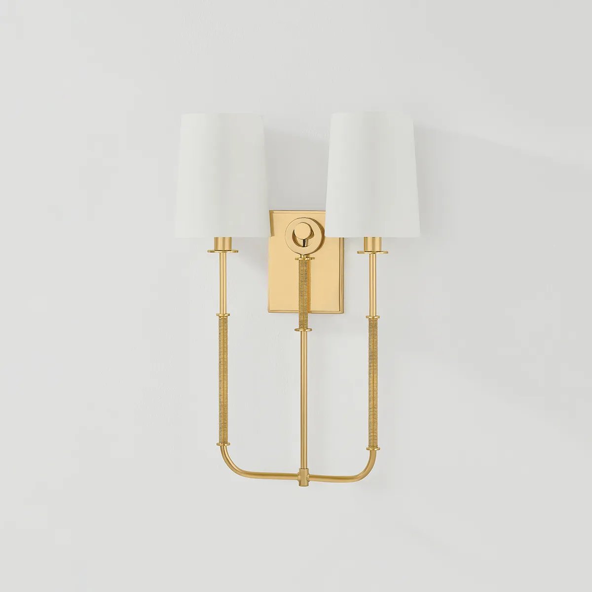 The antique-inspired silhouette of the Glenmont sconce is slender and refined with machine-led hardware. Each stem features a horizontal knurl resembling a screw, adding texture and a contemporary feel to the fixture. Amethyst Home provides interior design, new home construction design consulting, vintage area rugs, and lighting in the Laguna Beach metro area.