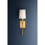 The antique-inspired silhouette of the Glenmont sconce is slender and refined with machine-led hardware. Each stem features a horizontal knurl resembling a screw, adding texture and a contemporary feel to the fixture. Amethyst Home provides interior design, new home construction design consulting, vintage area rugs, and lighting in the Laguna Beach metro area.