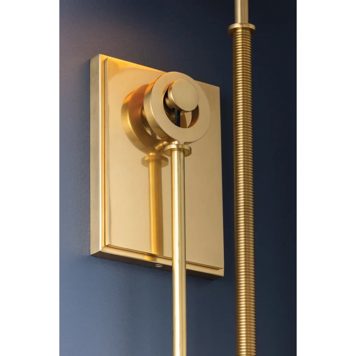 The antique-inspired silhouette of the Glenmont sconce is slender and refined with machine-led hardware. Each stem features a horizontal knurl resembling a screw, adding texture and a contemporary feel to the fixture. Amethyst Home provides interior design, new home construction design consulting, vintage area rugs, and lighting in the Monterey metro area.