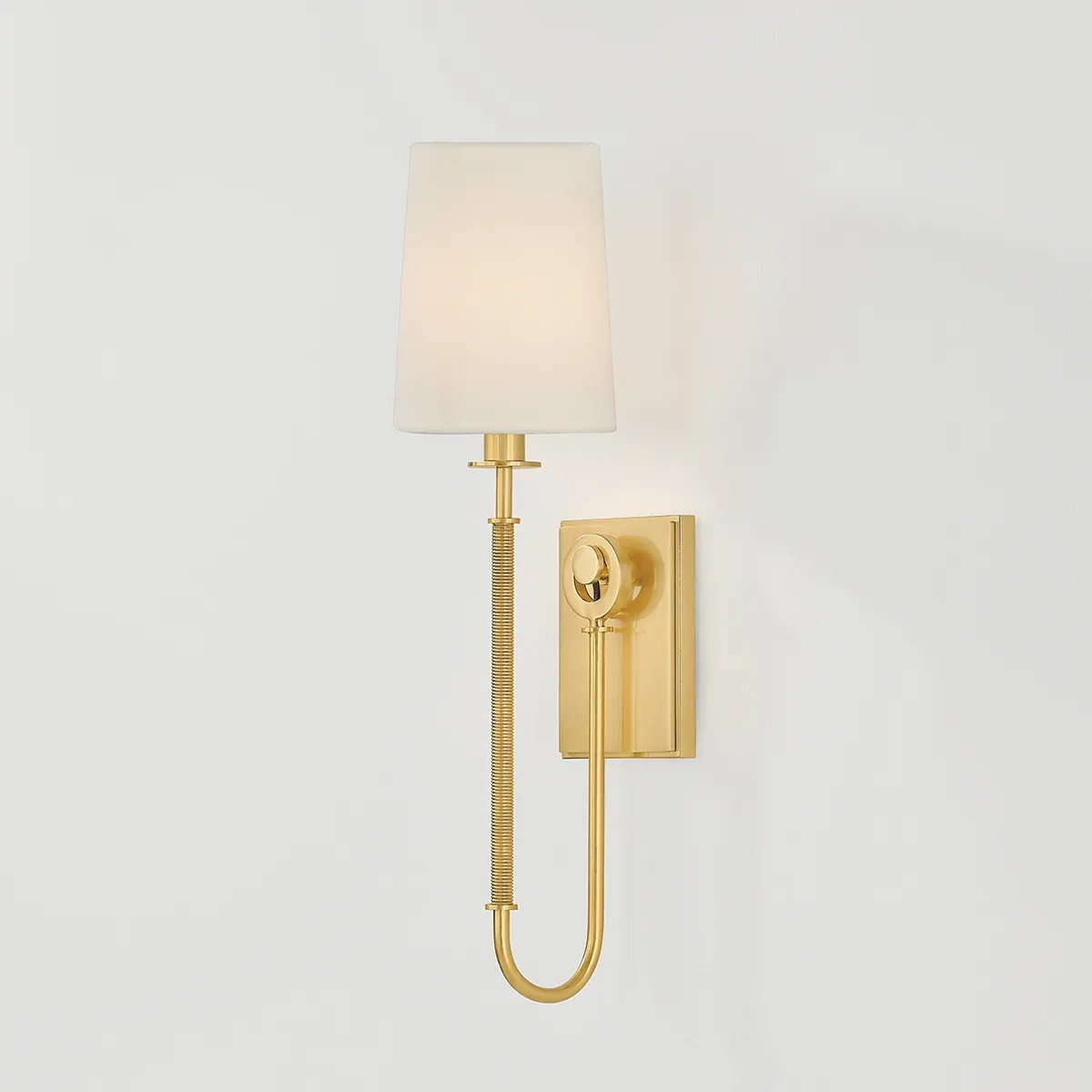 The antique-inspired silhouette of the Glenmont sconce is slender and refined with machine-led hardware. Each stem features a horizontal knurl resembling a screw, adding texture and a contemporary feel to the fixture. Amethyst Home provides interior design, new home construction design consulting, vintage area rugs, and lighting in the San Diego metro area.