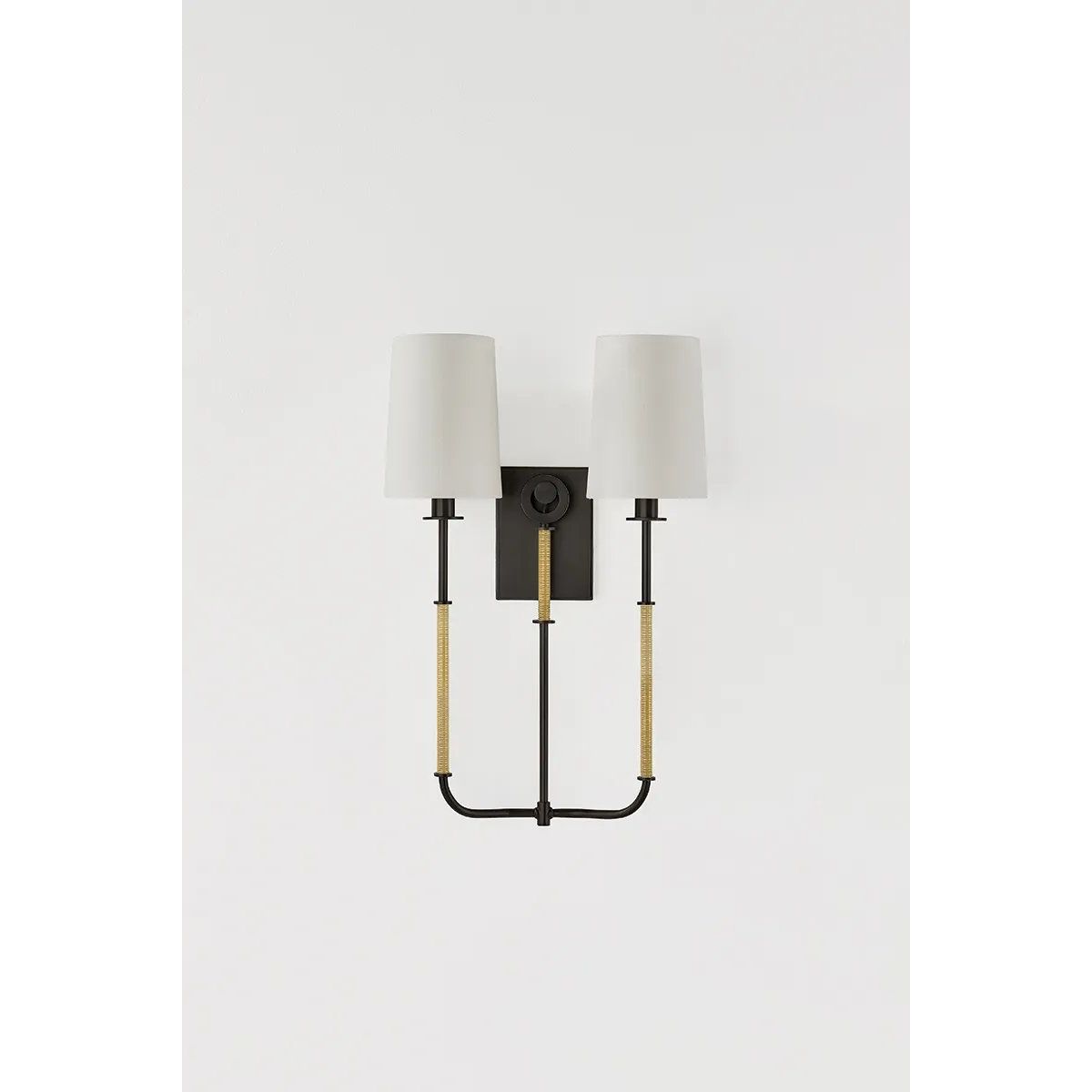 The antique-inspired silhouette of the Glenmont sconce is slender and refined with machine-led hardware. Each stem features a horizontal knurl resembling a screw, adding texture and a contemporary feel to the fixture. Amethyst Home provides interior design, new home construction design consulting, vintage area rugs, and lighting in the Newport Beach metro area.