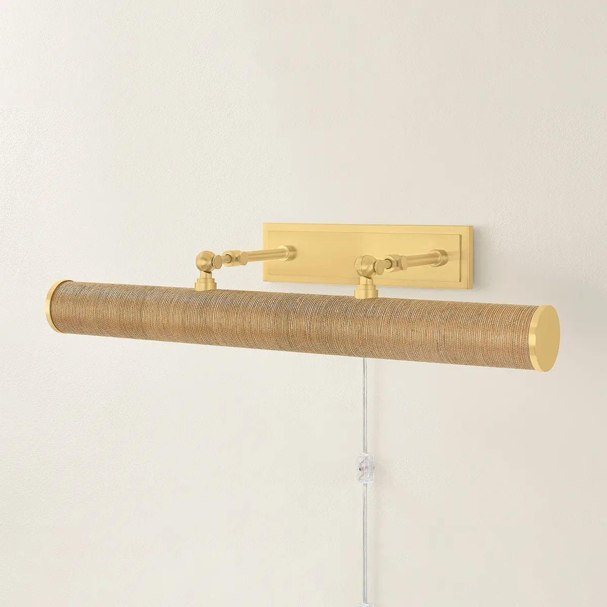 Whether you want to bring more attention to artwork or highlight a wall shelf of your favorite things, Holly is up to the task. This plug-in picture light now comes in an Aged Brass or Natural Grasscloth finish to create a more traditional or distinctive look. Amethyst Home provides interior design, new home construction design consulting, vintage area rugs, and lighting in the Washington metro area.