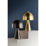 The contrast between the oblong domed shade and the conical base of Hopkinton creates a striking geometric design. Whether this petite lamp is finished in Aged Brass or Distressed Bronze, the on-trend mushroom silhouette adds a dose of personality. Its integrated rechargeable LED light source ensures lasting functionality.  Amethyst Home provides interior design, new home construction design consulting, vintage area rugs, and lighting in the Charlotte metro area.