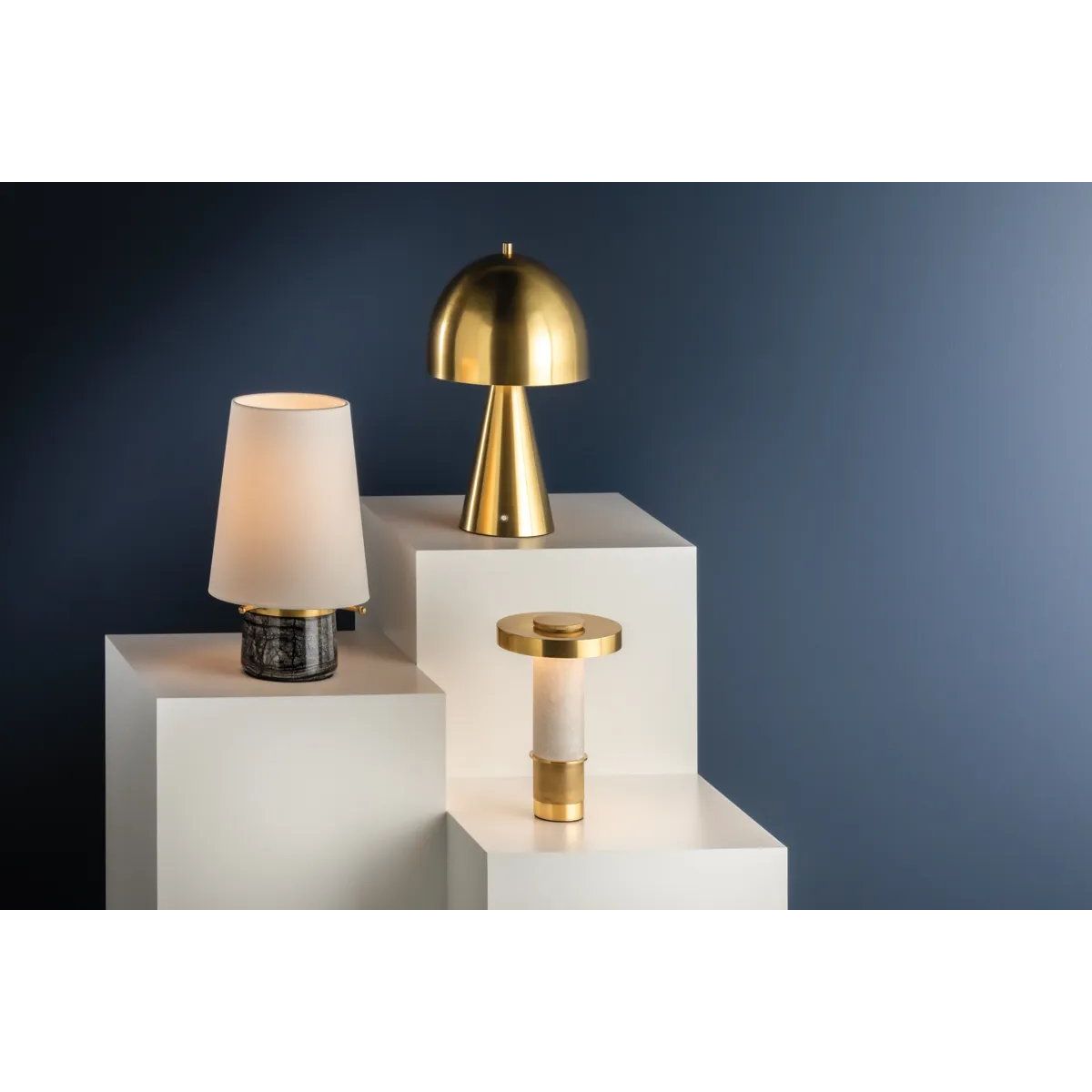 The contrast between the oblong domed shade and the conical base of Hopkinton creates a striking geometric design. Whether this petite lamp is finished in Aged Brass or Distressed Bronze, the on-trend mushroom silhouette adds a dose of personality. Its integrated rechargeable LED light source ensures lasting functionality.  Amethyst Home provides interior design, new home construction design consulting, vintage area rugs, and lighting in the Washington metro area.