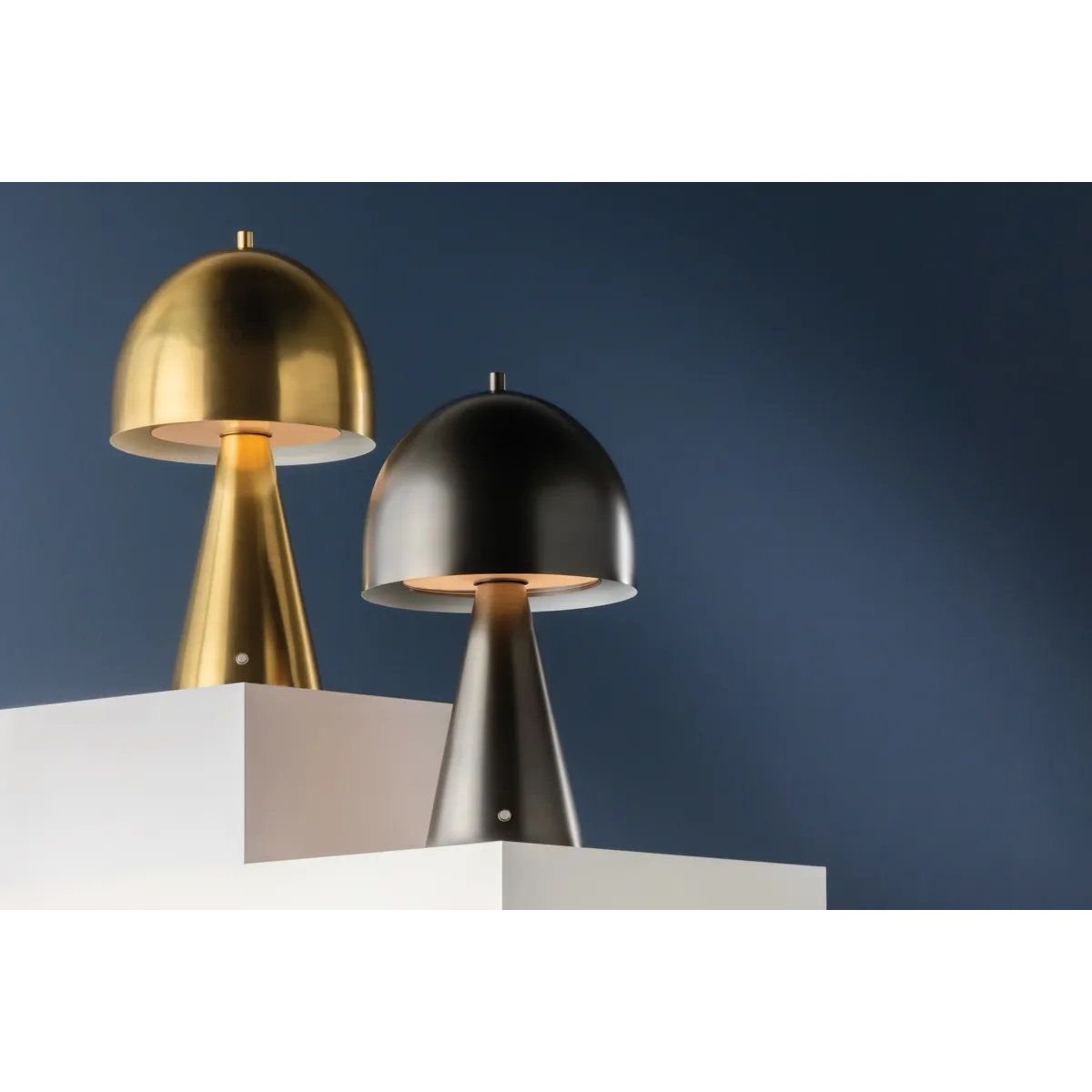 The contrast between the oblong domed shade and the conical base of Hopkinton creates a striking geometric design. Whether this petite lamp is finished in Aged Brass or Distressed Bronze, the on-trend mushroom silhouette adds a dose of personality. Its integrated rechargeable LED light source ensures lasting functionality.  Amethyst Home provides interior design, new home construction design consulting, vintage area rugs, and lighting in the Laguna Beach metro area.