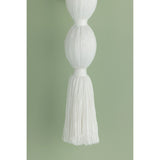 A celebration of authentic handicraft, the cinched silhouette of Indra resembles an elongated tassel. The cotton string and white linen shade create an all-over light, fresh appearance, accented by Aged Brass hardware at the neck. This single-light sconce serves as an artistic piece for small spaces in need of a spruce. Amethyst Home provides interior design, new home construction design consulting, vintage area rugs, and lighting in the San Diego metro area.