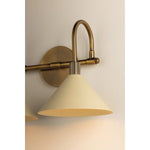 A modern interpretation of Art Deco shapes, the Jovani bath bar features elongated arms and sharply tapered Soft Sand shades. The clean design highlights the connections between elements through pronounced fittings and subtle fluting details. Finished in classic Patina Brass, Jovani is available with 1, 2, or 3 lights. Amethyst Home provides interior design, new home construction design consulting, vintage area rugs, and lighting in the Calabasas metro area.