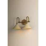 A modern interpretation of Art Deco shapes, the Jovani bath bar features elongated arms and sharply tapered Soft Sand shades. The clean design highlights the connections between elements through pronounced fittings and subtle fluting details. Finished in classic Patina Brass, Jovani is available with 1, 2, or 3 lights. Amethyst Home provides interior design, new home construction design consulting, vintage area rugs, and lighting in the Winter Garden metro area.