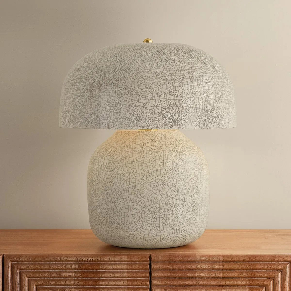 The Leetown lamp reimagines an iconic mushroom silhouette with playful proportions and a highly textured finish. Putting a modern spin on a traditional crackle glaze, ink is applied between the fractured plates to create a striking, graphic effect. Amethyst Home provides interior design, new home construction design consulting, vintage area rugs, and lighting in the Calabasas metro area.