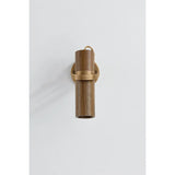 Crafted from walnut wood and Patina Brass, this spotlight sconce combines functional articulation with a natural, handcrafted feel. Its slim, cylindrical head pivots within the U-shaped cuff, which itself rotates at the backplate to provide a complete range of motion. Amethyst Home provides interior design, new home construction design consulting, vintage area rugs, and lighting in the Boston metro area.