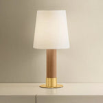 The Meadowbrook rechargeable lamp reinterprets a traditional silhouette with charming details. A beautifully grained light oak base rests upon a scalloped Aged Brass foot, introducing a graphic floral element. Topped with a classic white linen shade, the design balances decorative appeal with modern tailoring. Amethyst Home provides interior design, new home construction design consulting, vintage area rugs, and lighting in the Seattle metro area.