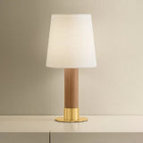 The Meadowbrook rechargeable lamp reinterprets a traditional silhouette with charming details. A beautifully grained light oak base rests upon a scalloped Aged Brass foot, introducing a graphic floral element. Topped with a classic white linen shade, the design balances decorative appeal with modern tailoring. Amethyst Home provides interior design, new home construction design consulting, vintage area rugs, and lighting in the Seattle metro area.