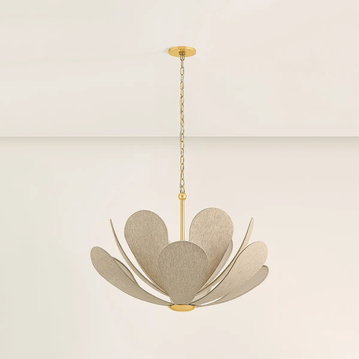 Inspired by the softly layered petals of a coneflower, this whimsical pendant blooms in mid-air to create an airy centerpiece. The natural linen shades of Nadine curl into a staggered, domed array that conceals the inner light source. Elegantly suspended from a refined Aged Brass rod and chain, Nadine is a botanic delight for the modern home.  Amethyst Home provides interior design, new home construction design consulting, vintage area rugs, and lighting in the Monterey metro area.