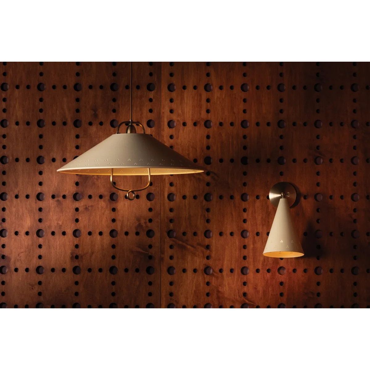 Drawing inspiration from the relaxed style of coastal villages, the Pawley family is carefree yet intentional. The pendant features graceful metalwork with a Historic Bronze finish, including a charming loop below the Soft Sand shade. With an adjustable swivel head, the sconce lets you direct light exactly where needed. Amethyst Home provides interior design, new home construction design consulting, vintage area rugs, and lighting in the Houston metro area.