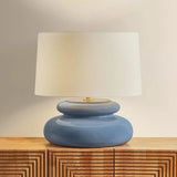 An exploration of voluminous forms and soft, endearing colors, the Pia family leans into the playful side of lighting. Stout proportions, generous curves, and stacked ceramic disc shapes lend an artisanal feel that is enhanced by the Butter Crackle and Chateau Crackle finishes. Amethyst Home provides interior design, new home construction design consulting, vintage area rugs, and lighting in the Scottsdale metro area.