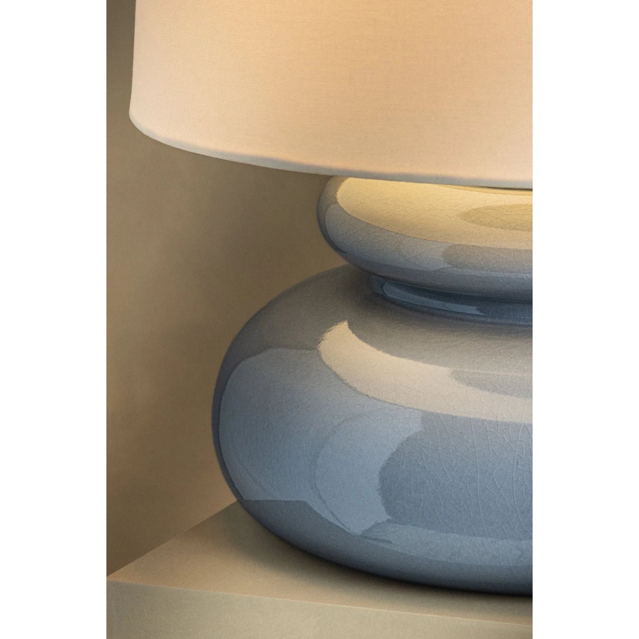 An exploration of voluminous forms and soft, endearing colors, the Pia family leans into the playful side of lighting. Stout proportions, generous curves, and stacked ceramic disc shapes lend an artisanal feel that is enhanced by the Butter Crackle and Chateau Crackle finishes. Amethyst Home provides interior design, new home construction design consulting, vintage area rugs, and lighting in the Winter Garden metro area.