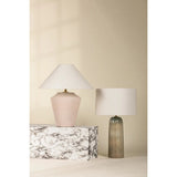 Inspired by raw beauty of the desert, this whitewashed terracotta table lamp is calm and refreshing. The textural body contrasts beautifully with the angular tapered white linen shade. An Aged Brass frame provides a surprising metallic finish. Part of THELIFESTYLEDCO® collection. Amethyst Home provides interior design, new home construction design consulting, vintage area rugs, and lighting in the Monterey metro area.