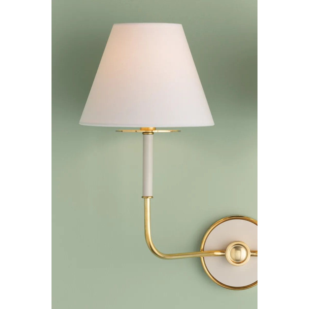 The refined framework and soft, tailored shades of Wedgewood evoke a sense of timeless, European charm. Available with one or two lights, this sconce features a classic shape, mixed finishes, and gently curved metalwork. Amethyst Home provides interior design, new home construction design consulting, vintage area rugs, and lighting in the San Diego metro area.