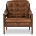 Featuring Halston Heirloom Sienna Chair by Four Hands at Amethyst Home. A Seventies-era style inspired by a flea market find, a dramatically tufted sling seat of black top-grain leather angles at the just-right pitch for total comfort, with wide, brown ash framing. Sourced from one of the oldest family-owned tanneries in Italy's Bassano del Grappa, heirloom. Amethyst Home provides interior design, new home construction design consulting, vintage area rugs, and lighting in the Park City metro area.